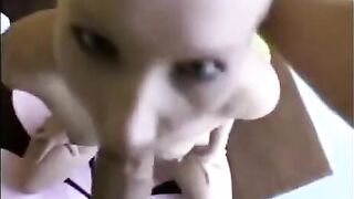 The chick in the frame is an avid sucker of huge cock heads