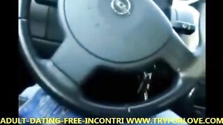Blonde girl pays the taxi driver with her mouth in the car