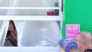 A hot brunette has sex with her boyfriend in a food truck