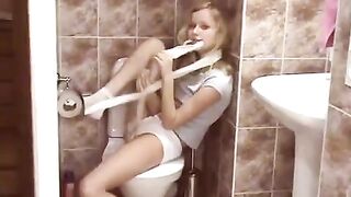 A hot blonde has a surprise for you in this public toilet scene!