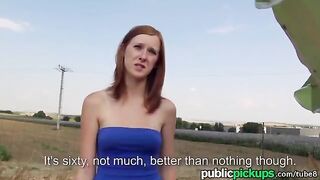A red-haired girl is having fun with her boyfriend in the hay