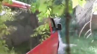 A man squeezed tits of a girl by the car and fucked her rough
