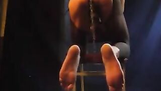 A cute man in pantyhose stands cancer and holds his dick firmly