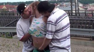 Sexy brunette in threesome sex with two guys, totally naked
