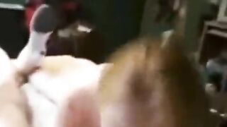 A man grabbed the girl and put her on the bed