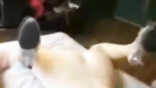 A man grabbed the girl and put her on the bed
