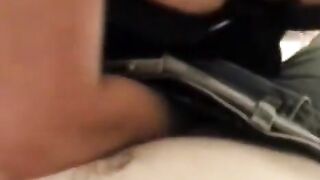A husband is having fun with his wife in a corset in the bedroom
