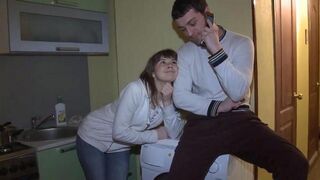 A wife is having fun in front of her husband’s surprised eyes