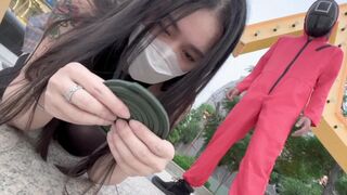 A hot Chinese girl participates in a risky game with sexy consequences