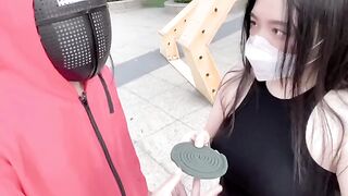 A hot Chinese girl participates in a risky game with sexy consequences