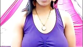 A girl is very excited and her nipples stick out through her T-shirt