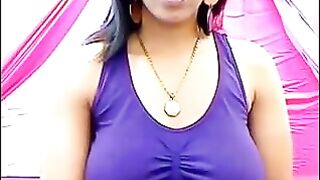 A girl is very excited and her nipples stick out through her T-shirt