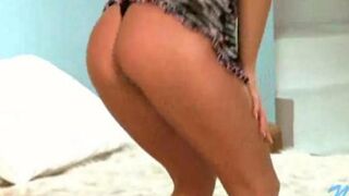 A young Russian whore demonstrates her stripping skills in front of the camera