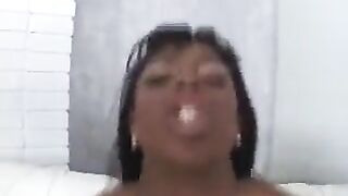 The black beauty gets her white guy cock sucked with her big tits