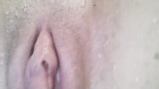 A female orgasm captured under water with a close-up view