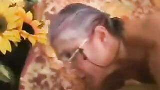 A mature woman in gray stockings was fucked by a man