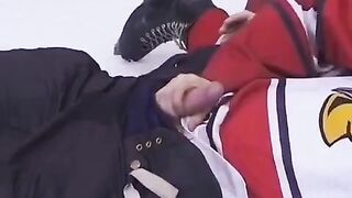The fan gave the hockey player her ass to play with during the game