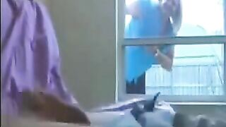 A woman peeps at a man jerking off in the ward