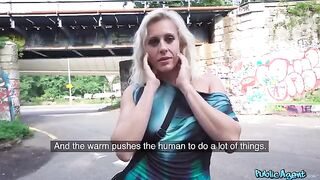 A blonde MILF is getting fucked right on the street