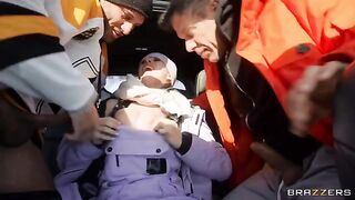 A snow angel has sex with two guys in a car outdoors