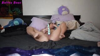 A hot young woman plays with her feet and makes a foot fetish movie