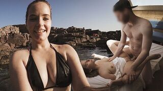 A couple enjoys sex on a sandy beach in Sardinia