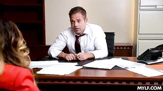 A Milf is having fun with her subordinate in the office