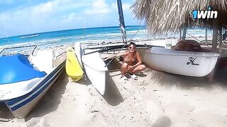 An amateur couple has sex right on the beach