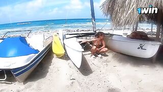 An amateur couple has sex right on the beach