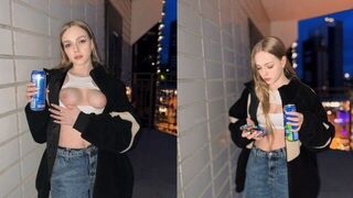 A girl showed more than just her tits for a can of energy drink