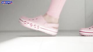 The girl was fucked on the bed in a suit