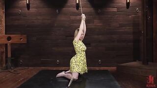 The girl is tied up and fucked with a vibrator in a rough BDSM session