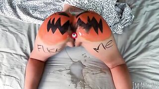 A slut is having fun with a pumpkin before getting fucked hard