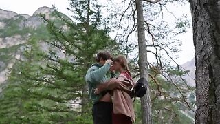A couple makes love in the forest, captured authentically