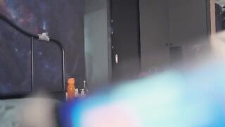 A girl in red underwear is asking a man to come into her room