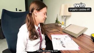 A schoolgirl is making her homework with the help of her stepbrother