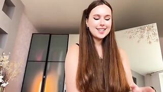 A sexy girl in a red dress makes her boyfriend cum with her tongue