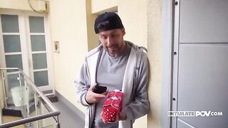 A brunette is being fucked in her ass by a foot fetish guy