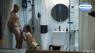 The couple has an intense encounter in a small shower stall, but it's just right for them