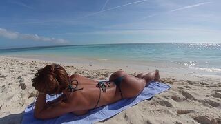 The ass is a powerful magnet for guys at the beach
