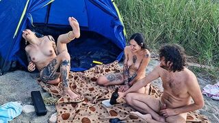 A game and sex with two stunning girls by the wood