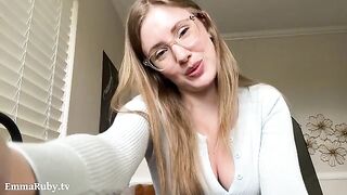 A girl with glasses gently caresses you, whispering sweet nothings in your ear