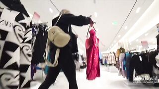 Babe almost gets caught while sucking dick in the fitting room